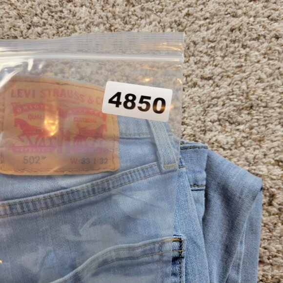 Levis 502 Jeans Mens 33x30 Tag 33x32 Blue Tapered Denim Flaw - Picture 8 of 8